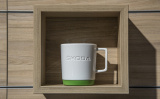 Фарфоровая кружка Skoda Mug with Green Silikone Pad, White/Green, артикул 000069601BK