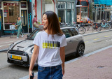 Женская футболка MINI T-Shirt 3-D Stripes Wing Logo, Women’s, White/Energetic Yellow/Black, артикул 80145A0A765
